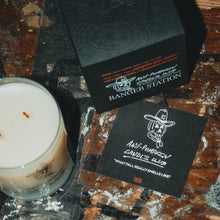 Load image into Gallery viewer, Candle and branded cards on a rustic wooden surface